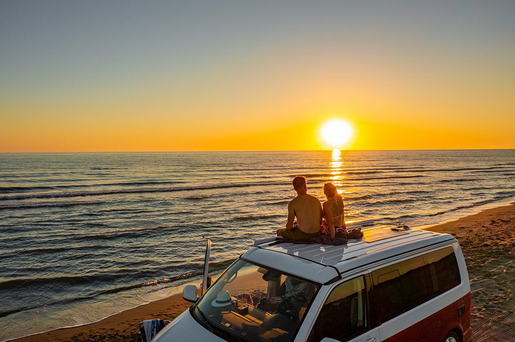 Relaxing by the sea at sunset